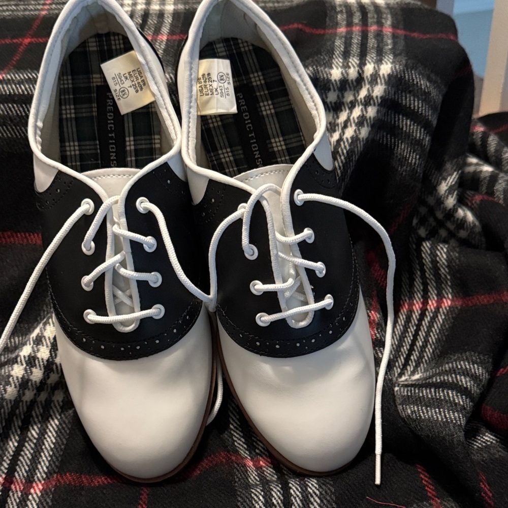 Classic Black and White Lace-Up Shoes